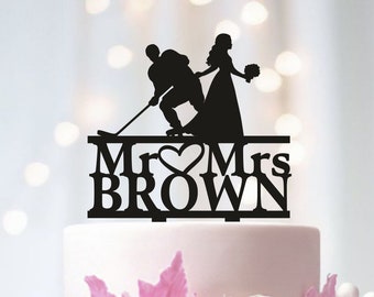 Décoration de gâteau de mariage hockey, décoration de gâteau pour couple hockey, fête de mariage sur le thème du hockey, mariage de joueurs de hockey, décoration de fête de hockey pour mariage