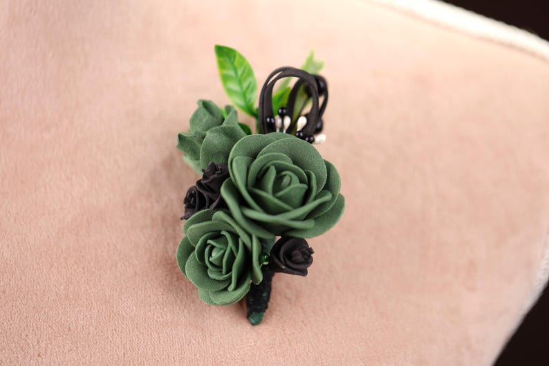a close up of a flower on a pillow