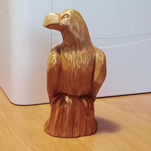 Small wooden eagle figurine hand carved. Majestic wooden sculpture of a bird of prey. Unique gift in the style of &quot;nature&quot;
