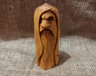 Odin statue. Wood carving. Scandinavian mythology. Nordic Gods. Wotan idol