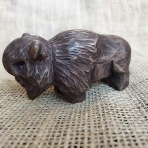 Hand Carved Wood Bison Statue: Grounding Spirit Animal