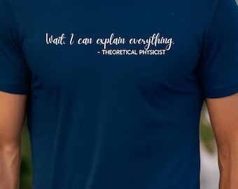 May include: A navy blue t-shirt with the text "Wait, I can explain everything - Theoretical Physicist" printed in white.
