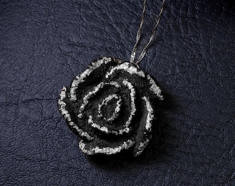 Santa Rosalia Rose pendant in Etna lava stone and pure platinum, patented and unique in the world. Handmade in Sicily.