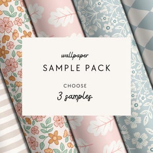May include: A wallpaper sample pack featuring four rolls with distinct patterns: a floral print in orange and pink, a pink oak leaf design, a blue floral motif, and a blue geometric pattern. The central white label displays the text wallpaper SAMPLE PACK CHOOSE 3 samples.