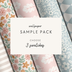 May include: A sample pack of wallpaper featuring three different patterns. The patterns include a floral design with pink and orange flowers, a pink pattern with white oak leaves, and a blue pattern with white flowers. The text on the image reads "wallpaper SAMPLE PACK CHOOSE 3 swatches".