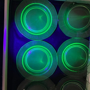 Set of 6 Uranium glass 6 inch saucers