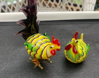 UV Murano Glass Chicken and Rooster Set. Hand blown with cool glow!