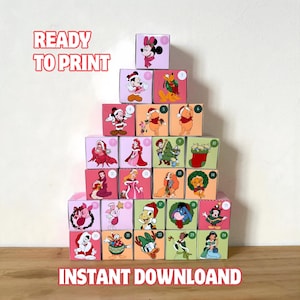 Puede incluir: Una pirámide de cajas rosas y naranjas con personajes de Disney, numeradas del 1 al 24. Las cajas tienen imágenes de Minnie Mouse, Mickey Mouse, Winnie the Pooh y otros personajes. El texto de la imagen dice "READY TO PRINT" e "INSTANT DOWNLOAD".