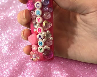 PINK  “cry baby” Bic junk lighter