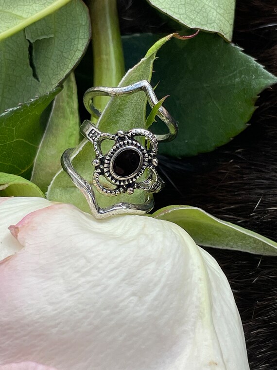 Funky silver and black ring stack - image 2