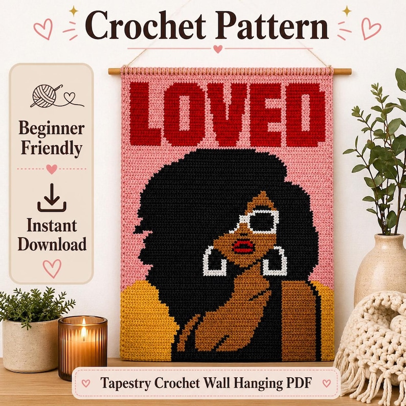 May include: A crochet wall hanging tapestry featuring the word LOVED in bold red letters over a pink background. The design depicts a person with dark skin, voluminous black hair, white-rimmed sunglasses, and large white hoop earrings.