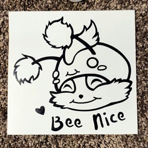 May include: Black and white sticker of a cartoon character with the text "Bee Nice" and a heart.