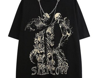 May include: Black t-shirt with a detailed cream-colored graphic of skeletal figures and the word "SIERCOW" in a stylized font. The shirt has short sleeves and a crew neck. The Etsy shop logo is in the upper left corner.