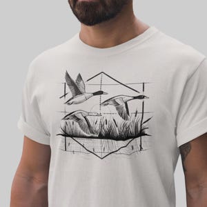 Duck Hunt Geometric T-Shirt | Waterfowl Hunter Tee | Flying Ducks Graphic Shirt | Outdoor Adventure Apparel for Hunting Enthusiasts