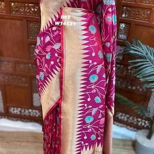 Banaras kathan sarees with Pichwai weaving floral all over sareeWith temple zari woven bordereither sides With rich pallu