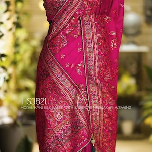 Rani pink Modal kani silk saree with jamewar weaving and intricate Meenakari detailing