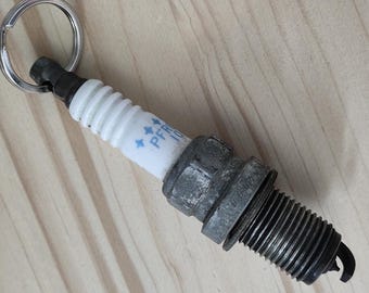 Llavero de bujía (nuevo o reciclado)