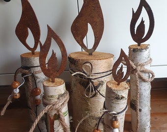 Decorative candle set patina flame on birch trunk rusty rust decoration