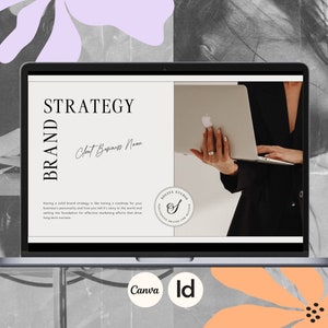 May include: A laptop screen displaying a brand strategy presentation with the text "BRAND STRATEGY" and "Client Business Name". The presentation includes a quote about the importance of having a well-defined brand strategy. The laptop is on a table with a floral design.