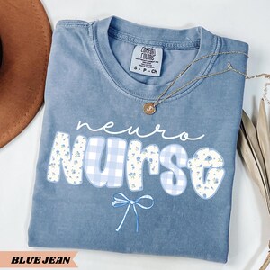 Comfort Colors t-shirt with floral design for neurology nurses, ideal as a graduation or appreciation gift for neuro ICU or neuroscience staff.