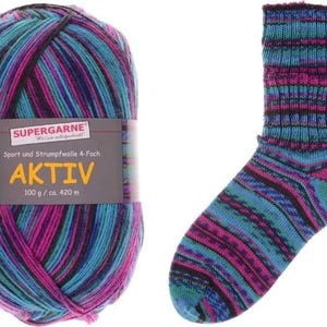 May include: A ball of Supergarne Aktiv yarn and a matching sock. The yarn is a blend of blue, pink, and black. The sock has a similar color pattern. The label reads "Sport und Strumpfwolle 4-Fach AKTIV 100 g / ca. 420 m."