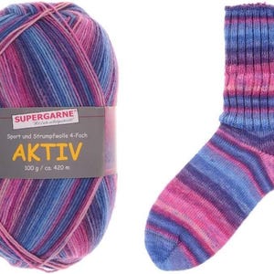 May include: A ball of multi-colored yarn and a matching sock. The yarn is labeled "SUPERGARNE AKTIV" and is a blend of pink, blue, and purple. The sock is knitted with the same color scheme.