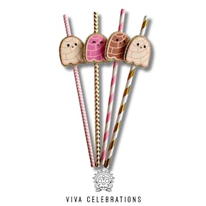May include: Four decorative straws with concha-shaped toppers in beige, pink, and brown. The straws have striped and zig-zag patterns in pink, gold, and white. The Viva Celebrations logo is at the bottom.