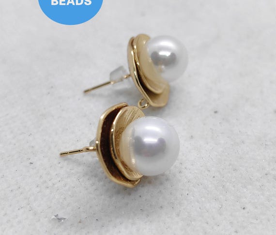 ホワイトパールスタッドイヤリング：10mm バロックスタイル - Etsy 日本