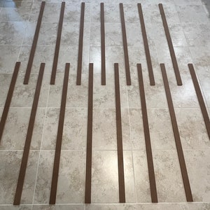pre-cut MDF wall panels, square grid wall paneling, modern accent wall, wall paneling for living room, bedroom feature wall panels, black wall panels, contemporary wall decor, easy install wall panels, unpainted MDF panels, bathroom accent wall, MDF wall panels, geometric wall decor, chevron wall panels, DIY wall paneling kit, unpainted MDF panels, modern accent wall, powder room wall decor, custom wall panels, 3D wall design, chevron accent wall, DIY bathroom remodel, wall panel kit MDF
