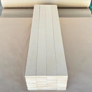 pre-cut MDF wall panels, square grid wall paneling, modern accent wall, wall paneling for living room, bedroom feature wall panels, black wall panels, contemporary wall decor, easy install wall panels, unpainted MDF panels, bathroom accent wall, MDF wall panels, geometric wall decor, chevron wall panels, DIY wall paneling kit, unpainted MDF panels, modern accent wall, powder room wall decor, custom wall panels, 3D wall design, chevron accent wall, DIY bathroom remodel, wall panel kit MDF