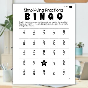 May include: A black and white bingo card with the title "Simplifying Fractions Bingo". The card has a 5x5 grid with fractions in each square. The center square says "Free Space".