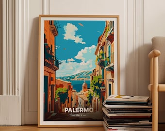 May include: A framed poster with a colorful illustration of a narrow street in Palermo, Italy. The street is lined with buildings and has a view of the ocean in the distance. The poster has the text "PALERMO - ITALY" at the bottom.