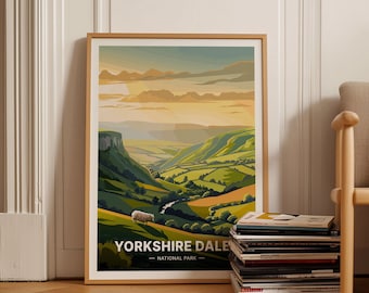 May include: A framed poster with a colorful illustration of a valley landscape with a sheep in the foreground. The poster has the text "Yorkshire Dales - National Park" at the bottom.