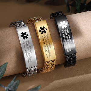 May include: Three medical alert bracelets with different colored metal bands. Each bracelet has a black star of life symbol and engraved text that reads "Type 2 Diabetes", "ICD MOM 123 666686548", and "ICD MOM 159 5872 25449".