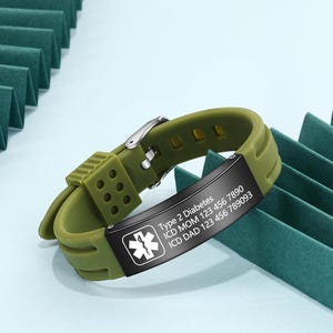 May include: Green silicone medical alert bracelet with a black metal plate that reads "Type 2 Diabetes, ICD MOM 123 456 7890, ICD DAD 123 456 789093". The plate also has a silver medical symbol.