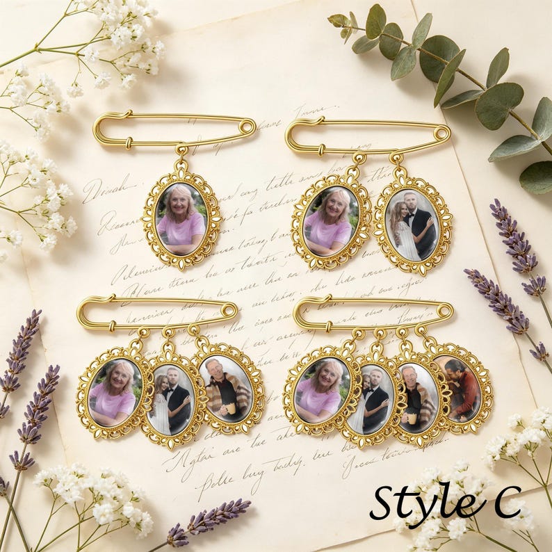 May include: Four gold-toned safety pin brooches featuring oval-shaped frames with decorative scalloped edges. Each frame contains a small photograph of individuals. The brooches vary in the number of attached photo pendants, ranging from one to four.