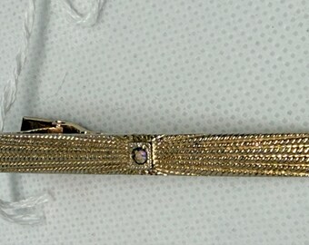 Pinza para corbata vintage en tono dorado con textura de diamantes de imitación AB, sin marca, para hombre.