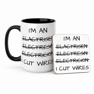 May include: A white ceramic mug with a black handle and interior, paired with a square coaster. Both items feature the text I'M AN, followed by three crossed-out misspelled words, the word ELECTRICIAN, and the phrase I CUT WIRES in black font.