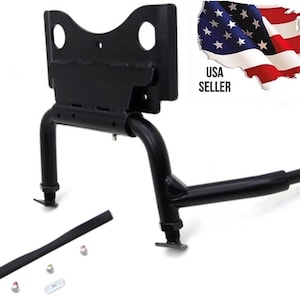 May include: Black motorcycle stand with a metal base and a long arm. The stand is designed to hold a motorcycle upright. It includes a rubber pad and hardware for installation. USA SELLER.