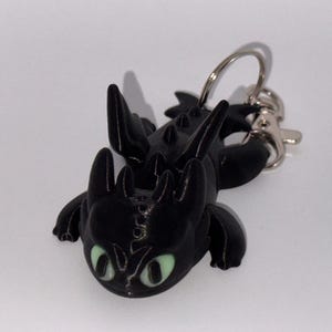 Flexi Dragon Keychain Schwarzer Drache mit Glow in the Dark Augen