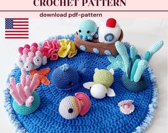 May include: A crocheted ocean-themed playmat with a variety of sea creatures, including a whale, a turtle, a fish, a starfish, and coral. The playmat is blue with a white border and is perfect for a child's room.
