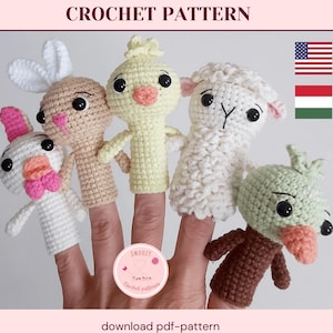 May include: Five finger puppets, a chick, a bunny, a lamb, a duck, and a chick, are all crocheted in different colors. The puppets are on a hand, and the background is white.