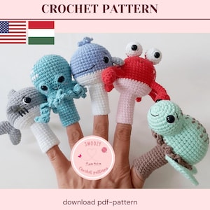 Könnte beinhalten: Häkelanleitung mit fünf Fingerpuppen: ein grauer Hai, ein blauer Oktopus, ein blauer Wal, eine rote Krabbe und eine grüne Schildkröte. Die Puppen sind handgefertigt und auf Fingern dargestellt. Der Text "CROCHET PATTERN" und "download pdf-pattern" sind sichtbar.