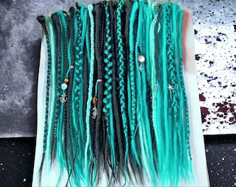 Statement-Making Teal and Black Dreadlocks: Trendy Hairpiece for a Bold Hairstyle