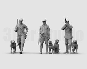 May include: A set of three unpainted gray miniature figures of hunters wearing flat caps and jackets, each accompanied by a dog. The figures are depicted in various poses, with some holding long-barreled firearms. The text 3DIMONTIS is visible.
