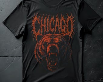 May include: Black t-shirt with a red illustration of a bear and the word "CHICAGO" above it. The bear has an open mouth and glowing eyes, with a spiky font. The design has detailed shading, creating a fierce look.