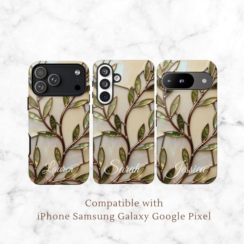 Three phone cases with a stained glass design featuring green leaves and branches on a cream background. Each case is personalized with a name: Lauren, Sarah, and Jessica. The cases are compatible with iPhone, Samsung Galaxy, and Google Pixel phones.