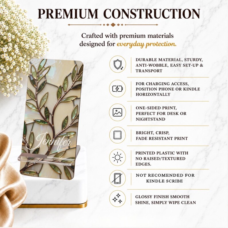 May include: A rectangular phone and tablet stand featuring a stained glass-style leaf pattern in shades of green and cream with the name Jennifer printed in white script. The stand includes text detailing product features and construction.