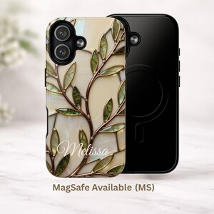 May include: A phone case featuring a stained glass-style pattern of green leaves and brown branches on a cream background. The name Melissa is printed in white script. A second black phone case with a circular MagSafe magnetic ring is visible.