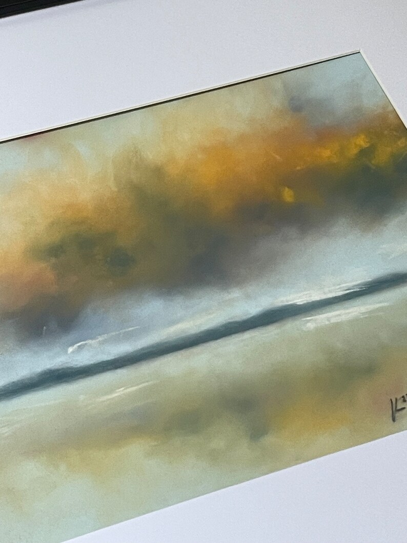 May include: A pastel painting of a seascape with a golden yellow sky and a blue-grey ocean. The painting has a soft, dreamy feel.